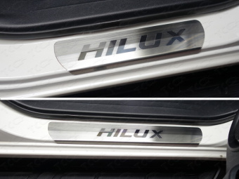 Накладки на пороги (лист шлифованный надпись Hilux)  Toyota Hilux 2015, 2016, 2017, 2018 годов