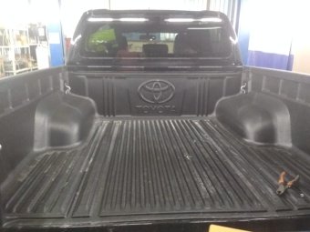 Вкладыш в кузов под борт (оригинал) Toyota Hilux 2015, 2016, 2017, 2018, 2019, 2020, 2021, 2022, 2023, 2024 годов